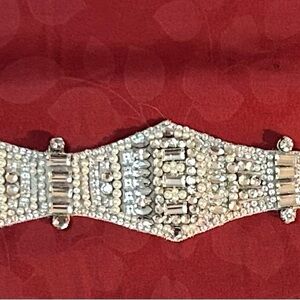 Elegant Bridal belt by Anne Barge with crystal and pearl embellishments.
